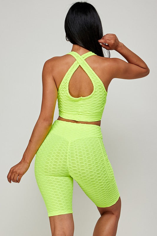 CONJUNTOS DE TOP CON SUJETADOR FRENTE Y PANTALONES CORTOS DE MOTORISTA