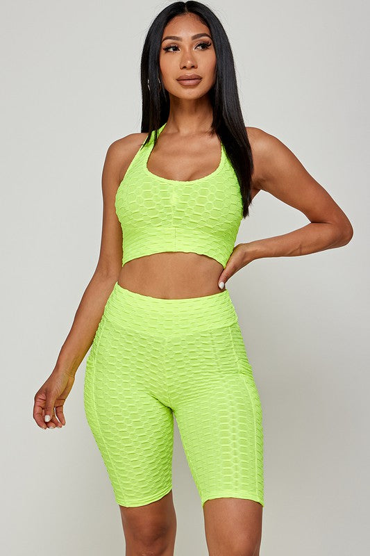 CONJUNTOS DE TOP CON SUJETADOR FRENTE Y PANTALONES CORTOS DE MOTORISTA