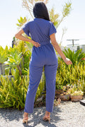 Thumbnail of TIE WAIST SURPLICE V-NECK JUMPSUIT