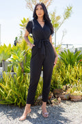 Thumbnail of TIE WAIST SURPLICE V-NECK JUMPSUIT