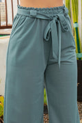 Thumbnail of PANTALONES DE PERNERA ANCHA, LISOS, CON PLISADO Y CINTURA LAZADA