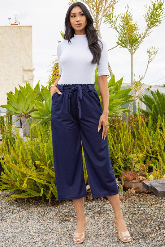 PANTALONES DE PERNERA ANCHA, LISOS, CON PLISADO Y CINTURA LAZADA