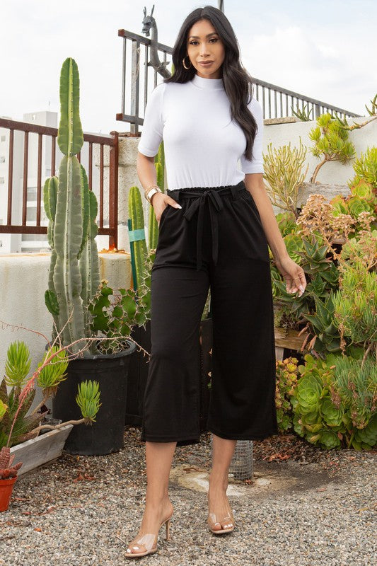 PANTALONES DE PERNERA ANCHA, LISOS, CON PLISADO Y CINTURA LAZADA