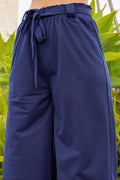Thumbnail of PANTALONES DE PERNERA ANCHA, LISOS, CON PLISADO Y CINTURA LAZADA