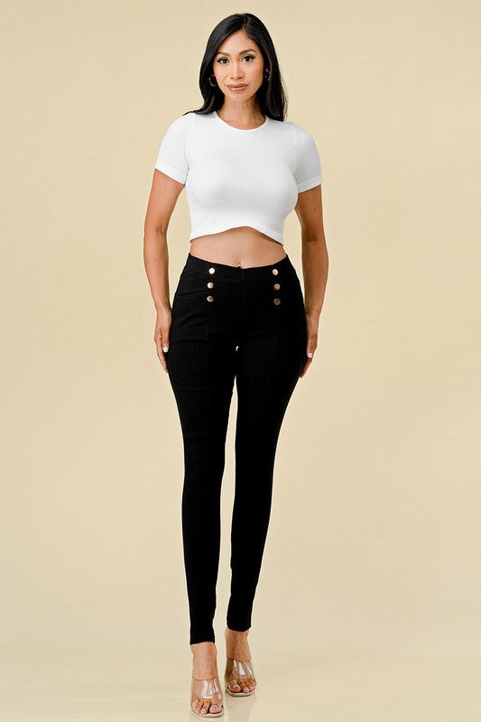 Solid fitted pants with pockets and elastic waist
