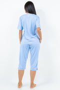 Thumbnail of Conjunto de blusa bordada y capri a juego