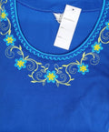 Thumbnail of Conjunto de blusa bordada y capri a juego
