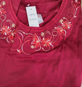 Thumbnail of Conjunto de blusa bordada y capri a juego