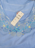 Thumbnail of Conjunto de blusa bordada y capri a juego