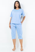 Thumbnail of Conjunto de blusa bordada y capri a juego