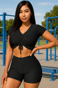 Thumbnail of Conjunto de top corto texturizado y pantalón corto biker