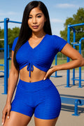 Thumbnail of Conjunto de top corto texturizado y pantalón corto biker