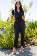 Thumbnail of TIE WAIST SURPLICE V-NECK JUMPSUIT